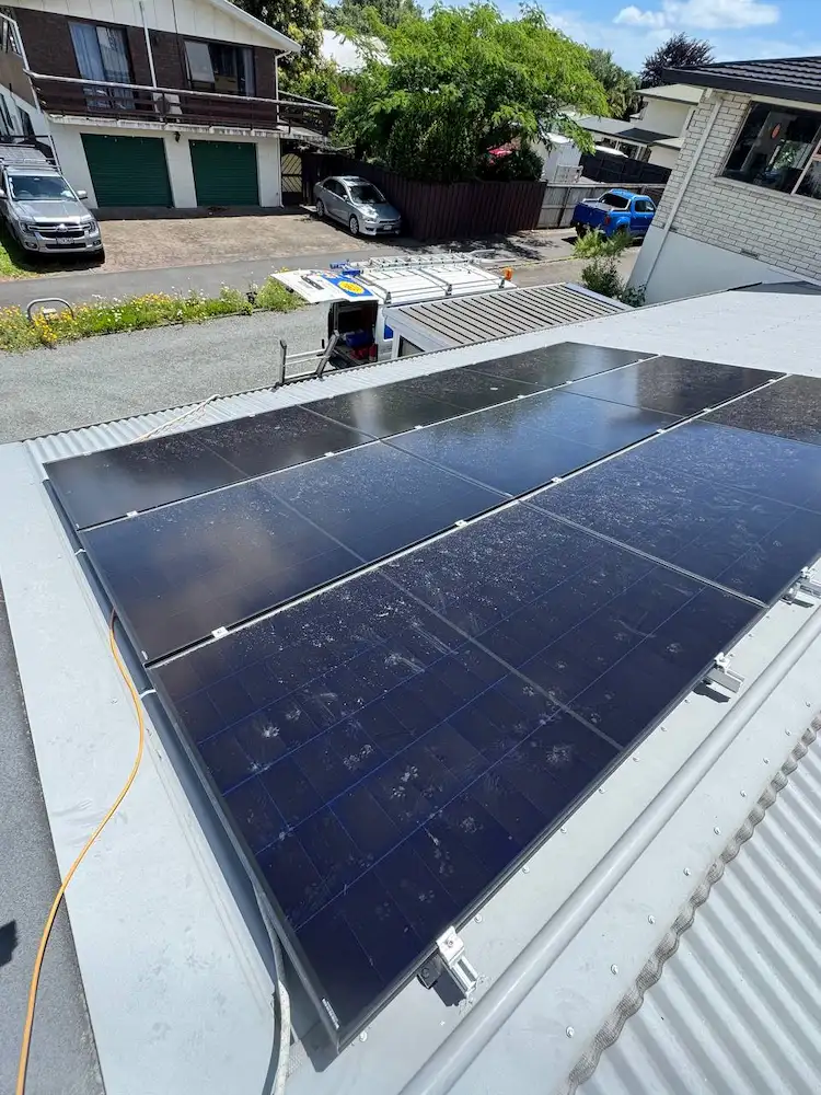 Weathered solar panels before cleaning in Mount Maunganui